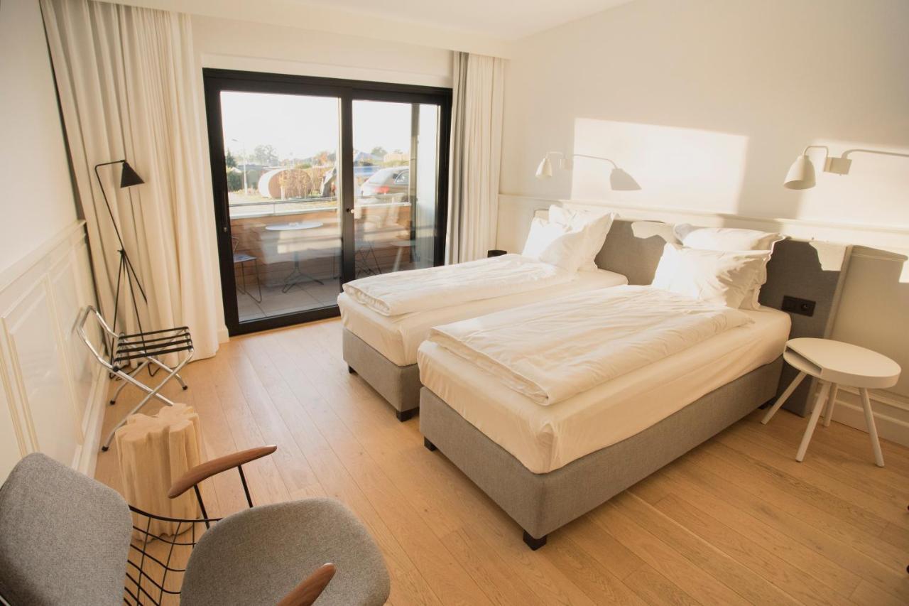 De Sjeiven Dorpel Hotel Maaseik Luaran gambar